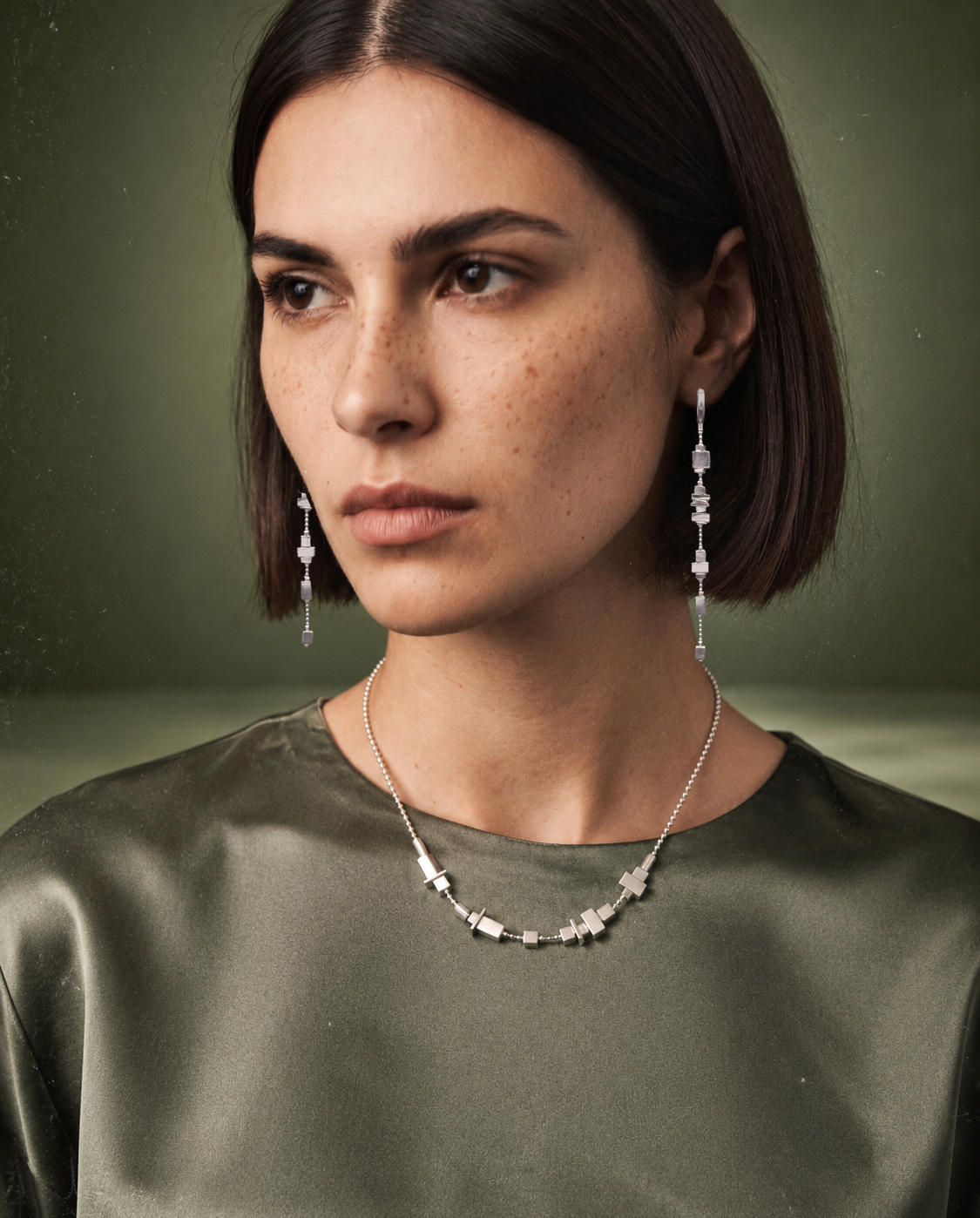 ZULIE sleep earrings worn by a model