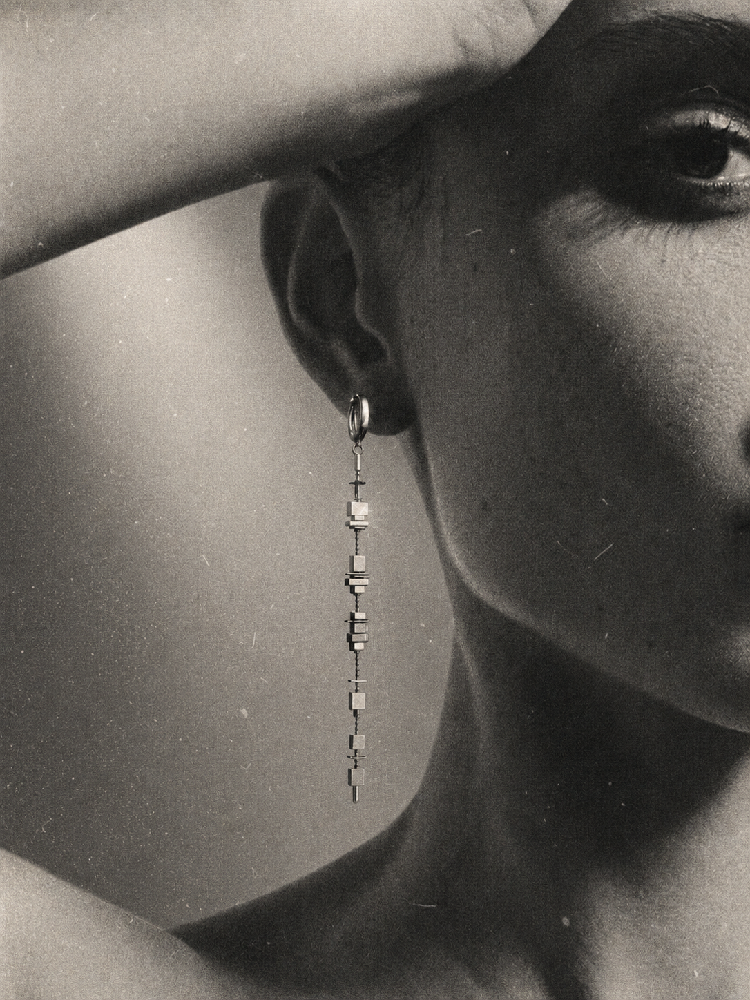 Model wearing a ZULIE sleep sculpture earring