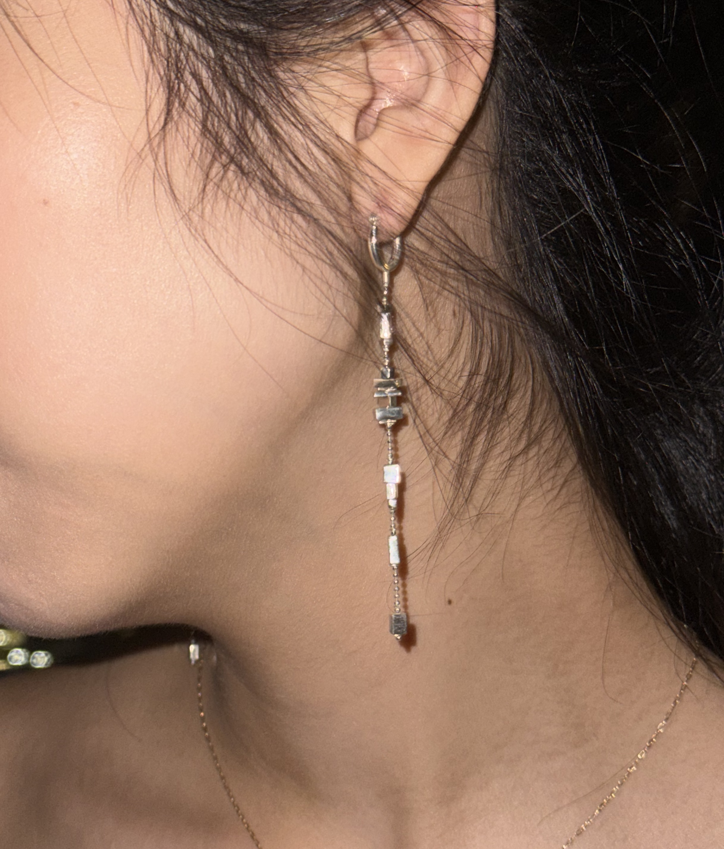 Isabel wearing ZULIE sleep earrings