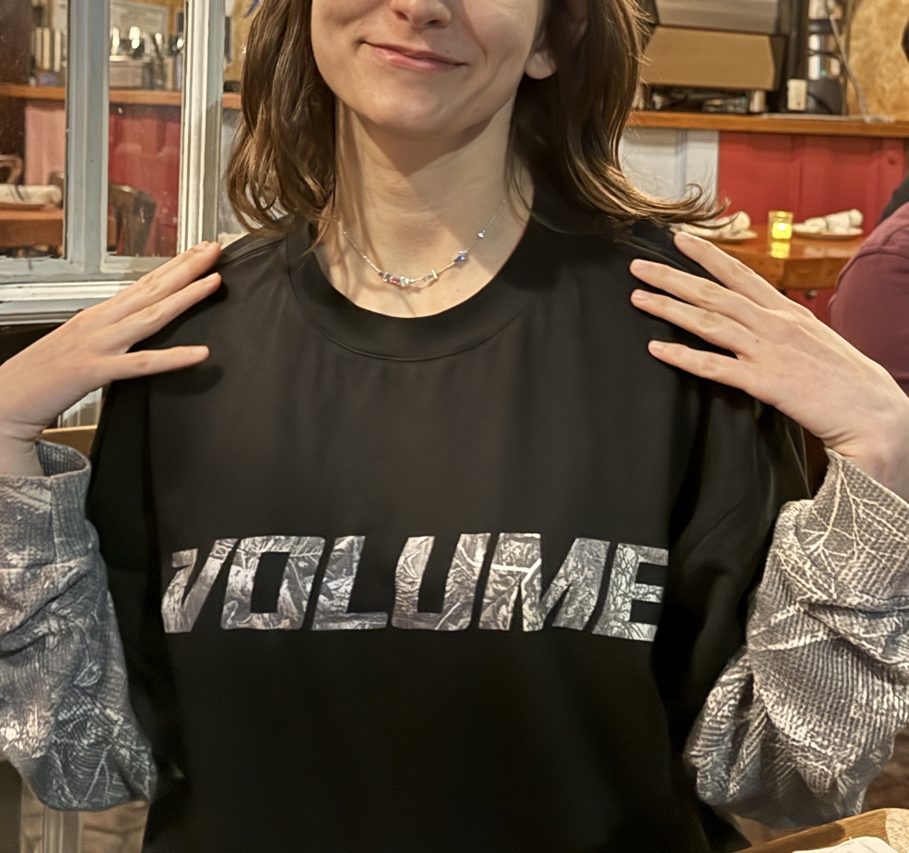Lauren wearing a ZULIE sleep necklace